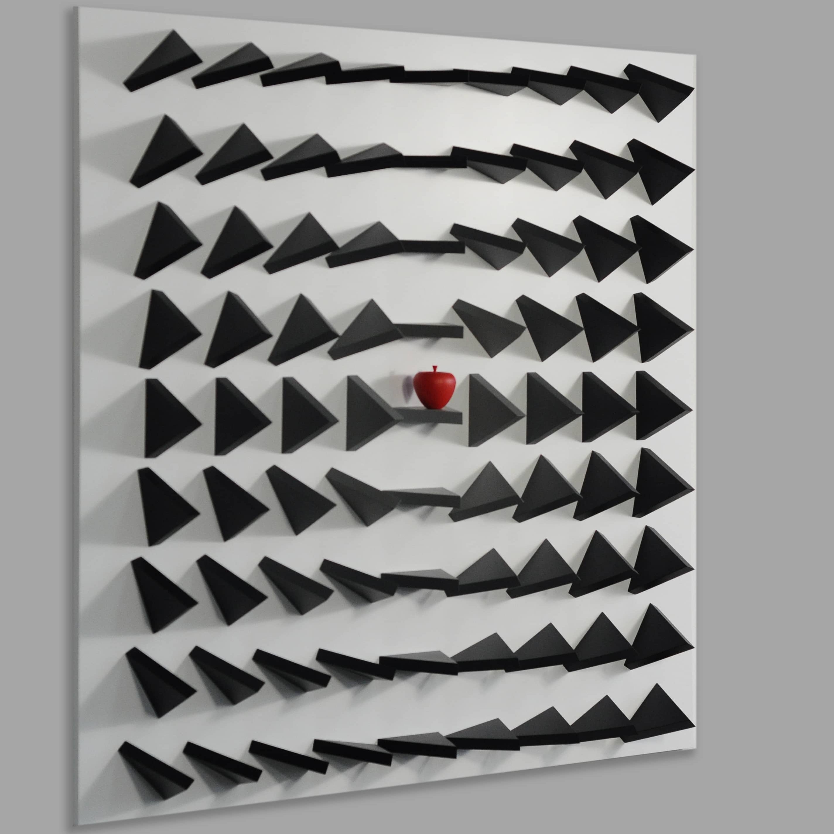 Abstract wall art with black geometric shapes on a gray background