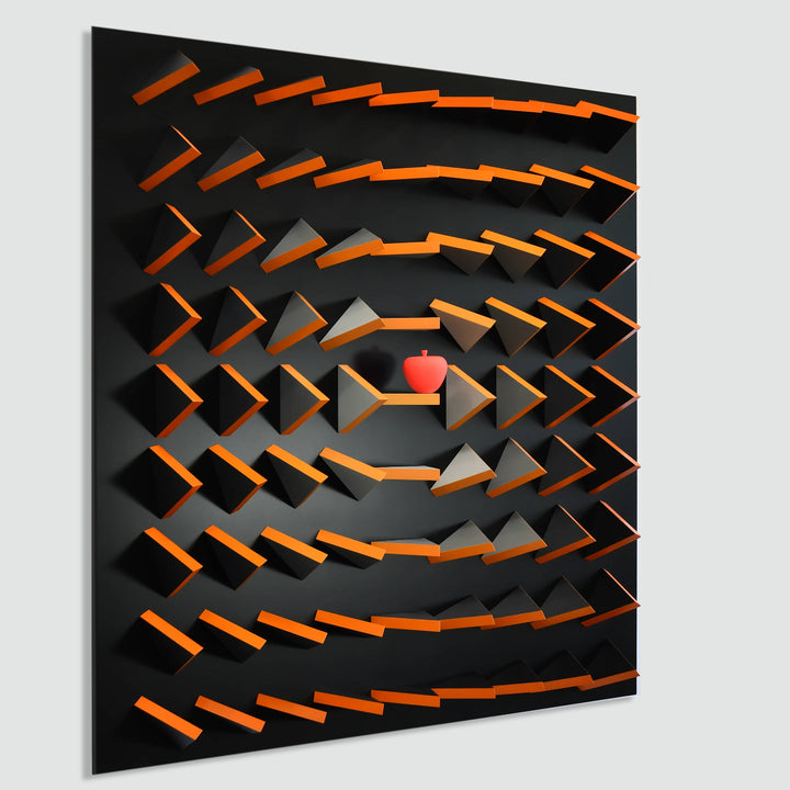 Geometric wall art with black, orange, and red colors on a gray background