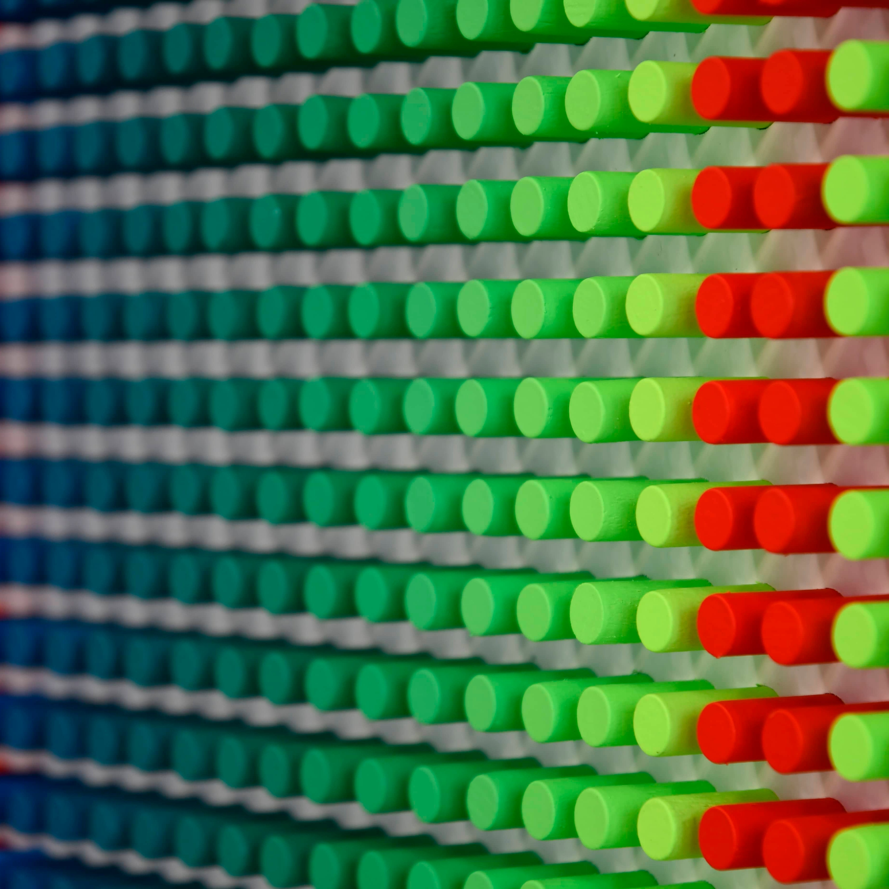 Close-up of colorful building blocks arranged in a pattern