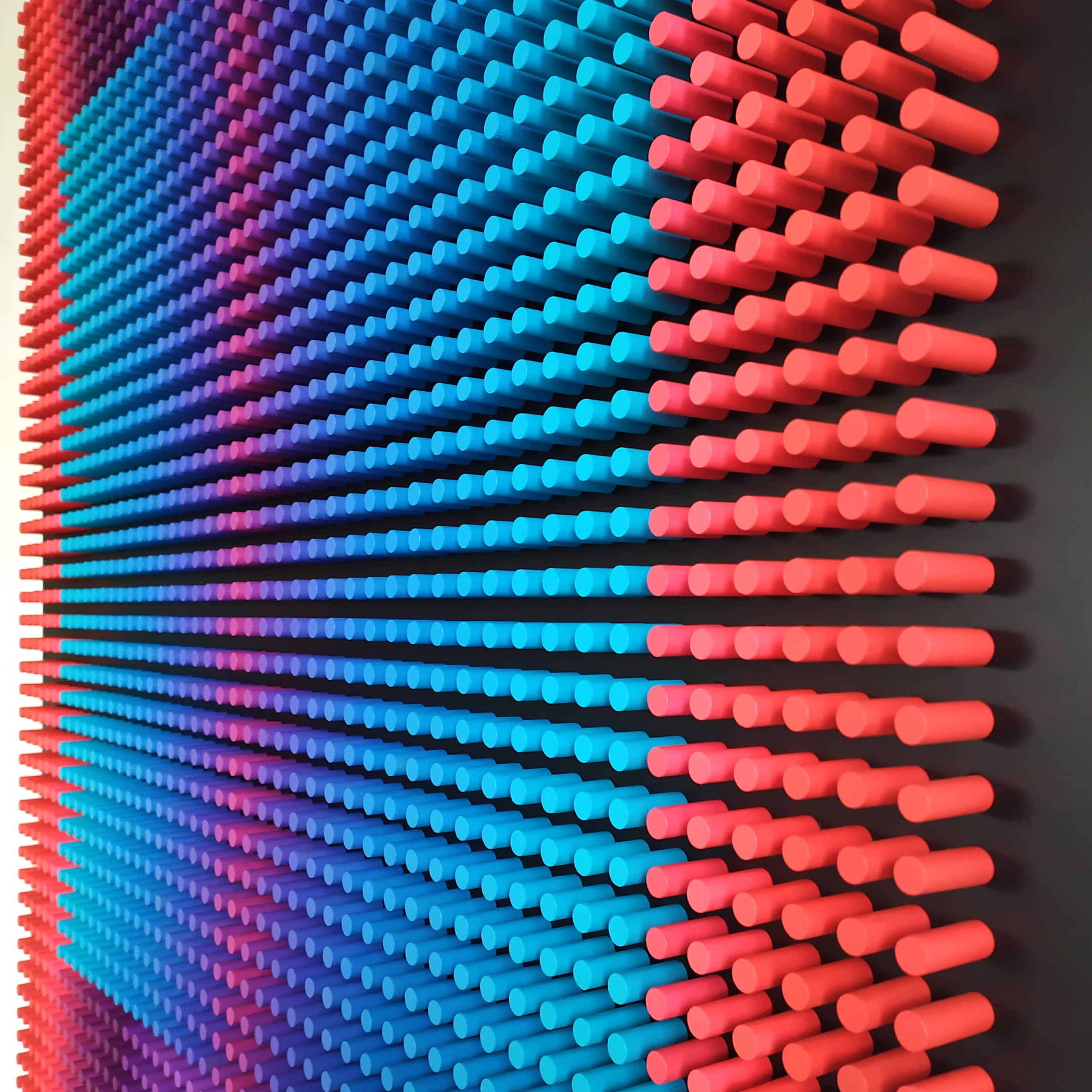 Colorful wooden wall panel with a geometric pattern